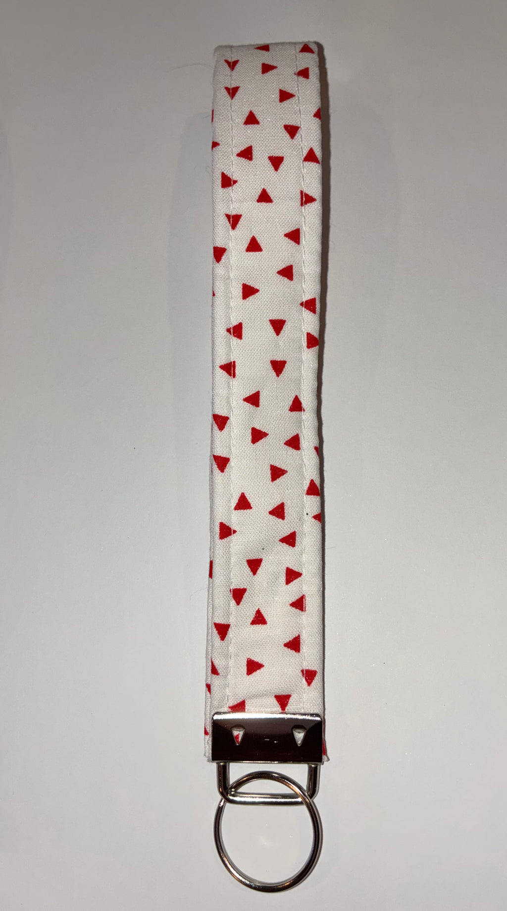 Red and white triangle wristlet keychain ￼