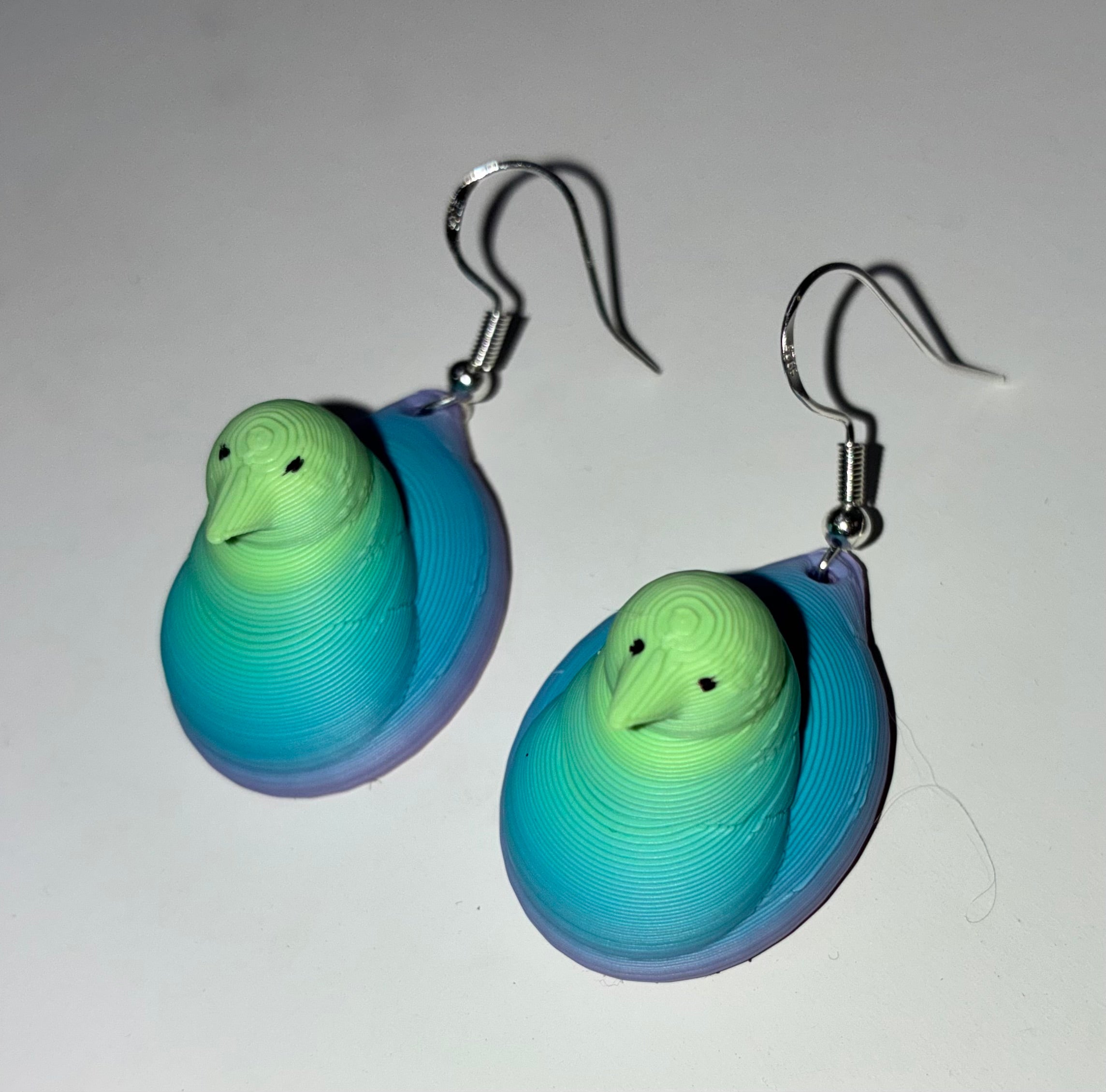 Peep multicolor earrings! 💜💙💚