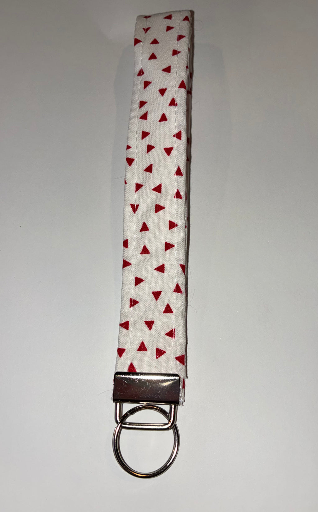 Red and white triangle wristlet keychain ￼