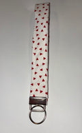Red and white triangle wristlet keychain ￼