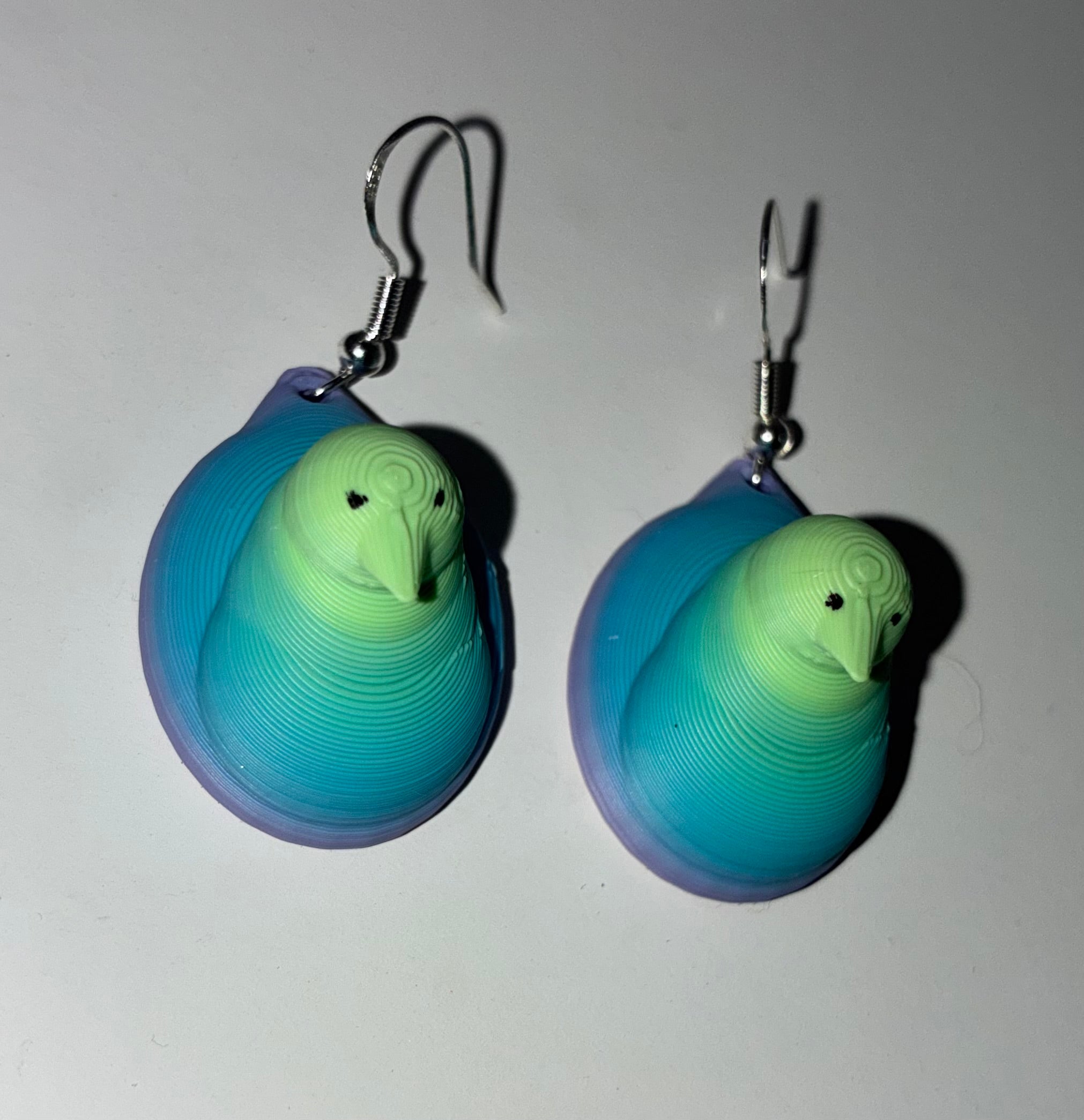 Peep multicolor earrings! 💜💙💚
